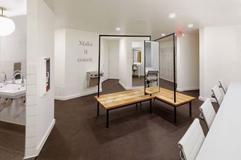 Fitness and strength training center with locker rooms